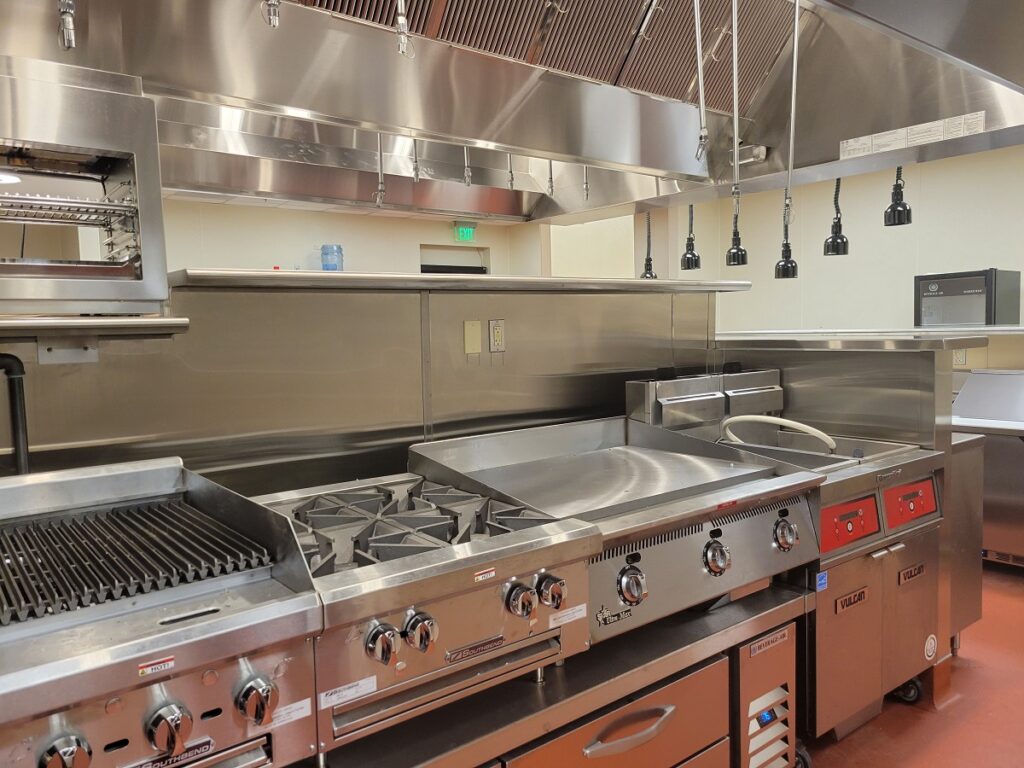 Full Commercial Cookline with Charbroiler, Gas Range, Flat-Top Griddle, Vulcan Fryers, and Heat Lamps - Portland Golf Club